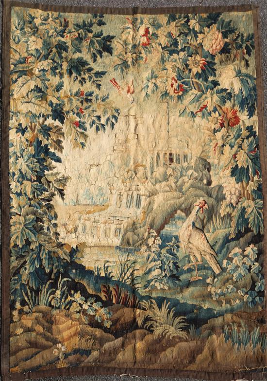 An 18th century Flemish verdure tapestry, 7ft 6in. x 5ft 3.5in.